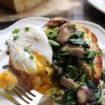 Poached Eggs Garlicky Mushrooms and Spinach over Brioche - Give it Some Thyme