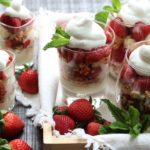 Roasted Strawberry & Lemon Cream Trifles | Give it Some Thyme - delicious layers of roasted strawberries, sweet lemon cream, ladyfingers and granola, then topped with Limoncello-spiked whipped cream! #strawberrytrifle #easystrawberrytrifle #roastedstrawberries #roastedstrawberriesdessert #lemoncream #springdessertrecipes #springdessertideas #easterdesserts #easterdessertsideas #easterdessertcreative #mothersdaydesserts #mothersdaydessertrecipes #giveitsomethyme
