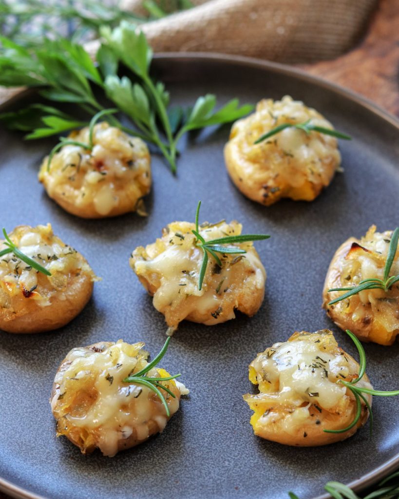 French Onion Smashed Potato Bites | giveitsomethyme.com – an easy appetizer recipe of smashed baby potatoes topped with caramelized onions, gruyere and fresh rosemary! #potatoappetizers #potatoappetizerseasy #potatoappetizersmini #potatoappetizersforparties #bakedpotatoappetizers #frenchonionbakedpotato #onionappetizers #babypotatorecipes #babypotatorecipessmashed #smashedpotatoes #smashedpotatoesrecipe #smashedpotatoesrecipethanksgiving #giveitsomethyme