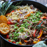 Pasta with Sausage & Fall Veggies | giveitsomethyme.com – a delicious recipe of linguine twirled with caramelized peppers, onions and mushrooms with zesty sausage and prosciutto in a dairy-free, creamy white wine Dijon sauce! #pastasausagerecipes #pastasausagerecipesskillets #pastasausagerecipescomfortfoods #pastaveggies #pastasausagedinner #pastadinner #pastadinnerrecipes #pastadinnerideas #pastadinnerparties #falldinnerideas #falldinnerrecipes #giveitsomethyme