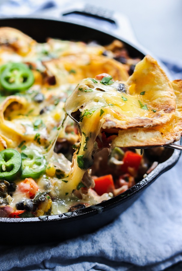 Mexican Chicken Tortilla Skillet | Give it Some Thyme – a quick, easy, cheesy and delicious one-pan meal! #mexicanchicken #mexicanchickenskillet #mexicanchickenrecipes #cheesymexicanchickenskillet #mexicanchickentortillaskillet #chickendinner #chickendinnerrecipes #quickchickendinners #quickandeasydinner #quickandeasydinnerrecipes #giveitsomethyme