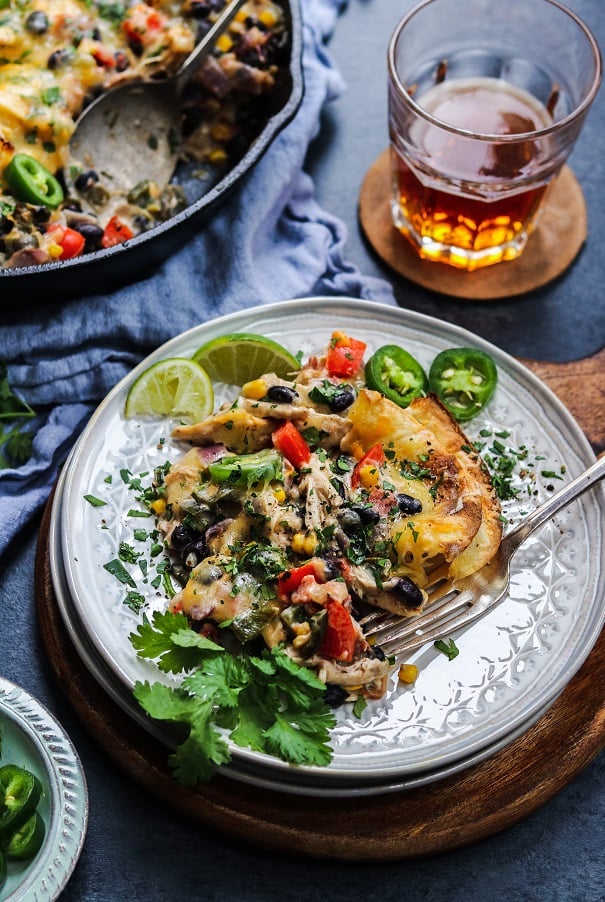 Mexican Chicken Tortilla Skillet Served | giveitsomethyme.com – a quick, easy, cheesy and delicious one-pan meal! #mexicanchicken #mexicanchickenskillet #mexicanchickenrecipes #cheesymexicanchickenskillet #mexicanchickentortillaskillet #chickendinner #chickendinnerrecipes #quickchickendinners #quickandeasydinner #quickandeasydinnerrecipes #giveitsomethyme