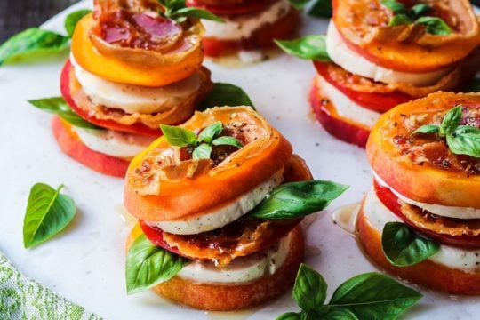 Peachy Caprese Pancetta Stacks – Layers of sweet ripe peaches with fresh mozzarella, tomatoes, basil and crispy pancetta drizzled with honeyed white balsamic glaze is what summer is all about. #peachcaprese #peachcapresestacks #appetizers #summerrecipes #healthyappetizers #easyrecipes #glutenfreerecipes #giveitsomethyme | giveitsomethyme.com