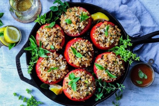 Mediterranean Rice Stuffed Tomatoes – make the most of peak season tomatoes stuffed with brown rice, roasted corn, green onion, feta and pistachios. Vegetarian & Gluten Free! #stuffedtomatoes #stuffedtomatoeshealthy #summerrecipes #mediterraneanrecipes #vegetariansides #easyrecipes #vegetarianmealprep #glutenfreerecipes #giveitsomethyme | giveitsomethyme.com