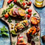 Late Summer Crostini Five Ways – you’ll love these delicious crostini combos showcasing summer’s bounty! From Top - Lemony Lump Crab, Heirloom Tomato Caprese, Mexican Street Corn & Chorizo, Tuscan Stone Fruit & Prosciutto, and Smoked Salmon & Cucumber Everything Bagel #crostini #summercrostini #appetizers #fingerfoods #fundinners #summerrecipes #giveitsomethyme | giveitsomethyme.com