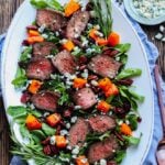 Mocha-Rubbed Steak & Spinach Salad – Move into fall by topping this juicy, spice-rubbed steak and fresh spinach with roasted squash, dried cranberries and pecans, then drizzle with a white balsamic rosemary vinaigrette! #steaksalad #steakandspinachsalad #butternutsquash #fallrecipes #healthyfalldinners #ketodinnerrecipes #glutenfreerecipes #giveitsomethyme | giveitsomethyme.com