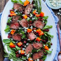 Mocha-Rubbed Steak & Spinach Salad – Move into fall by topping this juicy, spice-rubbed steak and fresh spinach with roasted squash, dried cranberries and pecans, then drizzle with a white balsamic rosemary vinaigrette! #steaksalad #steakandspinachsalad #butternutsquash #fallrecipes #healthyfalldinners #ketodinnerrecipes #glutenfreerecipes #giveitsomethyme | giveitsomethyme.com