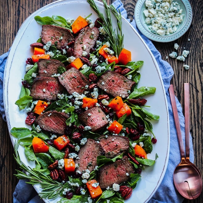 Mocha-Rubbed Steak & Spinach Salad – Move into fall by topping this juicy, spice-rubbed steak and fresh spinach with roasted squash, dried cranberries and pecans, then drizzle with a white balsamic rosemary vinaigrette! #steaksalad #steakandspinachsalad #butternutsquash #fallrecipes #healthyfalldinners #ketodinnerrecipes #glutenfreerecipes #giveitsomethyme | giveitsomethyme.com