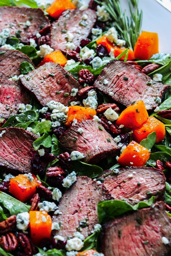 Mocha-Rubbed Steak & Spinach Salad – Move into fall by topping this juicy, spice-rubbed steak and fresh spinach with roasted squash, dried cranberries and pecans, then drizzle with a white balsamic rosemary vinaigrette! #steaksalad #steakandspinachsalad #butternutsquash #fallrecipes #healthyfalldinners #ketodinnerrecipes #glutenfreerecipes #giveitsomethyme | giveitsomethyme.com