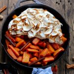 Cider Glazed Sweet Potatoes & Squash | Give it Some Thyme - sweet potatoes and butternut squash bathe in an apple cider and maple syrup glaze infused with fall spices then topped with a fluffy meringue! #sweetpotatorecipes #sweetpotatocasserole #ciderglazedsweetpotatoes #butternutsquash #skilletrecipes #fallrecipes #thanksgivingsides #thanksgivingsidedishes #giveitsomethyme