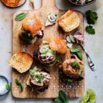 Turkey Sliders with Apple Rainbow Slaw - Take burger night to another level with these super tasty, quick and easy Turkey Sliders topped with a creamy and crunchy Apple Rainbow Slaw! #turkeysliders #turkeyburgers #burgers #sliders #applecoleslaw #sandwiches #lowfatrecipes #gamedayfood #superbowlfood #giveitsomethyme | giveitsomethyme.com