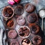 Dark Chocolate Lava Cupcakes - Chocolate lovers’ dreams are made of these warm, moist lava cupcakes with slightly crisp edges and oozing silky dark chocolate. Your family will love you even more! #lavacake #lavacupcakes #lavacupcakeseasy #darkchocolatecupcakes #dessert #dessertforparties #valentinesdaydessert #giveitsomethyme | giveitsomethyme.com
