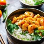 Orange & Honey Glazed Shrimp | Give it Some Thyme – an easy and delicious recipe of tender plump shrimp in a sweet n’ spicy orange glaze served with jasmine rice! #orangeglazedshrimp #orangeshrimp #easyorangeshrimp #chineseorangeshrimp #shrimpdinners #shrimpdinnerideas #shrimpdinnerhealthy #asianrecipes #healthydinners #lowfatrecipes #giveitsomethyme