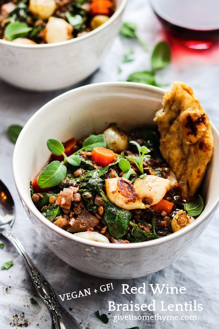 Red Wine Braised Lentils with Spinach & Pearl Onions | Give it Some Thyme - This hearty stew is chock-full of nutrients and rich, earthy flavor. Vegan comfort food at its finest!
