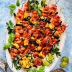Spicy Adobo Shrimp Skewers with Mango Avocado Salsa | giveitsomethyme.com - Delicious skewers of shrimp, pineapple, bell and poblano peppers, and red onion coated in a smoky, sweet n’ spicy glaze!