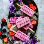 Triple Berry Yogurt Popsicles | giveitsomethyme.com – 5 ingredients and 5 minutes is all it takes to make these healthy and delicious popsicles you can even enjoy for breakfast!