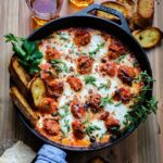 Cheesy Turkey Meatball Skillet | giveitsomethyme.com – Healthy turkey meatballs moistened with shredded zucchini and onion rather than breadcrumbs makes for the most tender meatballs ever!