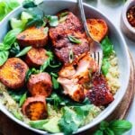 Jerk Salmon Quinoa Bowls w/ Sweet Potatoes & Spinach | giveitsomethyme.com – Fresh salmon fillets slathered in a jerk-spiced glaze along with roasted sweet potatoes and spinach over quinoa is a quick, easy and healthy dinner perfect for any night of the week!