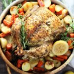 Lemon Roasted Chicken with Caramelized Vegetables served.