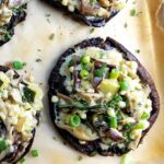 Large portobello mushrooms stuffed with a creamy mushroom spinach mixture and baked.