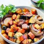 Caramelized vegetables in white bowl.